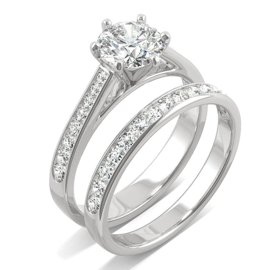 Elegant silver bridal ring set featuring a sparkling center stone and micro pavรฉ diamonds along the bands, showcasing the Moissanite Micro Pavรฉ Bridal Ring Set 2.5CT | GRA Certified.