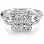 Close-up of a sparkling Moissanite Square Cluster Halo Ring 1.1CT | GRA Certified with a square cluster of stones and a split shank band encrusted with small gems.