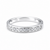 Round Moissanite Diamond Full Eternity Stackable Ring 1 Carat with a sleek silver band adorned with sparkling round moissanite diamonds set continuously around the ring.