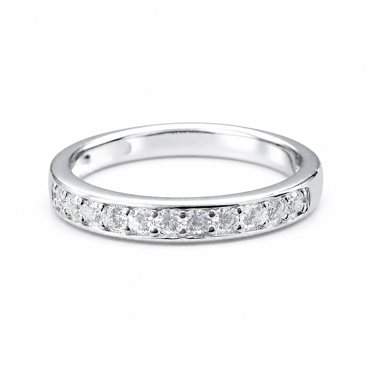 Round Moissanite Diamond Full Eternity Stackable Ring 1 Carat with a sleek silver band adorned with sparkling round moissanite diamonds set continuously around the ring.