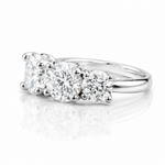 Moissanite 5-Stone Anniversary Ring 3.6CT | GRA Certified featuring three sparkling moissanite stones set in a polished silver band, elegant for women’s jewellery collections.