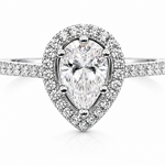 Pear Cut Moissanite Halo Engagement Ring 2CT | GRA Certified featuring a pear-shaped moissanite center stone surrounded by a halo of smaller stones on a diamond-accented band.