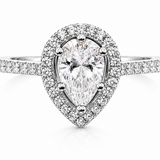 Pear Cut Moissanite Halo Engagement Ring 2CT | GRA Certified featuring a pear-shaped moissanite center stone surrounded by a halo of smaller stones on a diamond-accented band.