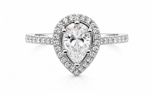 Pear Cut Moissanite Halo Engagement Ring 2CT | GRA Certified featuring a pear-shaped moissanite center stone surrounded by a halo of smaller stones on a diamond-accented band.