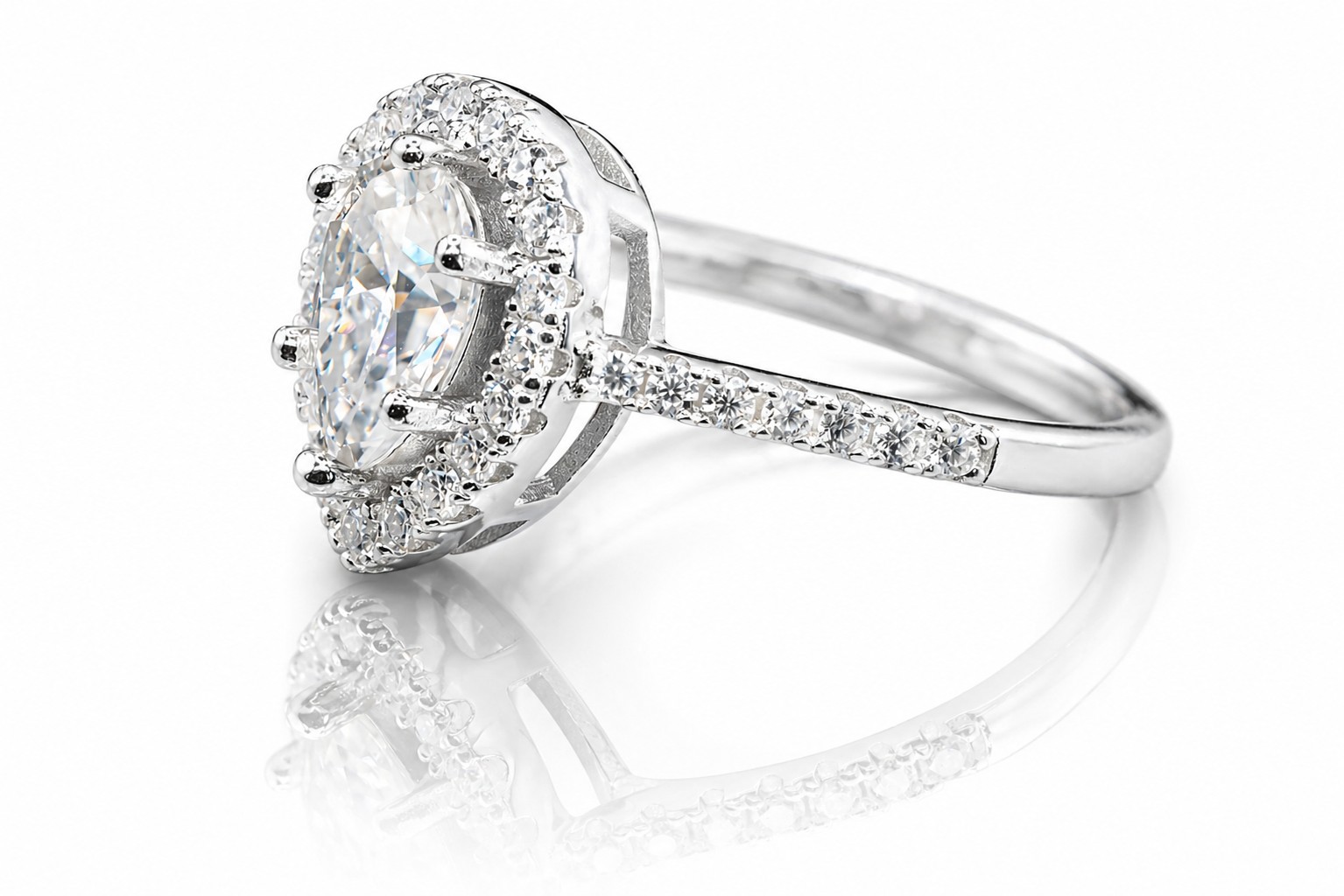 Pear Cut Moissanite Halo Engagement Ring 2CT | GRA Certified featuring a pear-shaped center stone surrounded by a sparkling halo and set on a diamond-accented band.