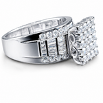 Close-up of a sparkling silver ring featuring a princess cut center stone surrounded by smaller diamonds, showcasing the Princess Cut Moissanite Cinderella Ring 2CT | GRA Certified.