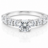 Round Moissanite Pave Engagement Ring 2.5CT | GRA Certified featuring a brilliant round center stone with a pave band of sparkling moissanite stones in a polished setting.