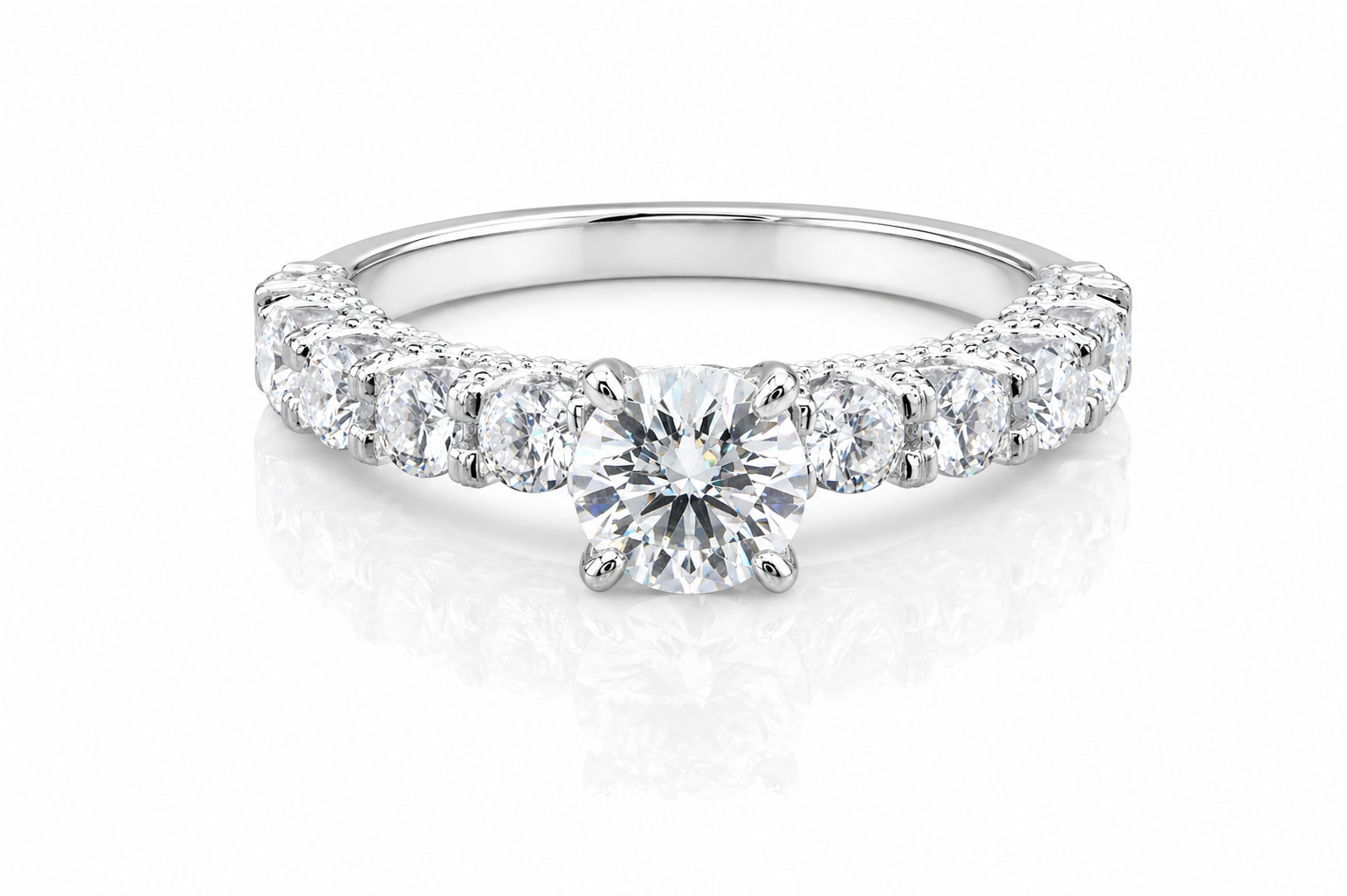 Round Moissanite Pave Engagement Ring 2.5CT | GRA Certified featuring a brilliant round center stone with a pave band of sparkling moissanite stones in a polished setting.