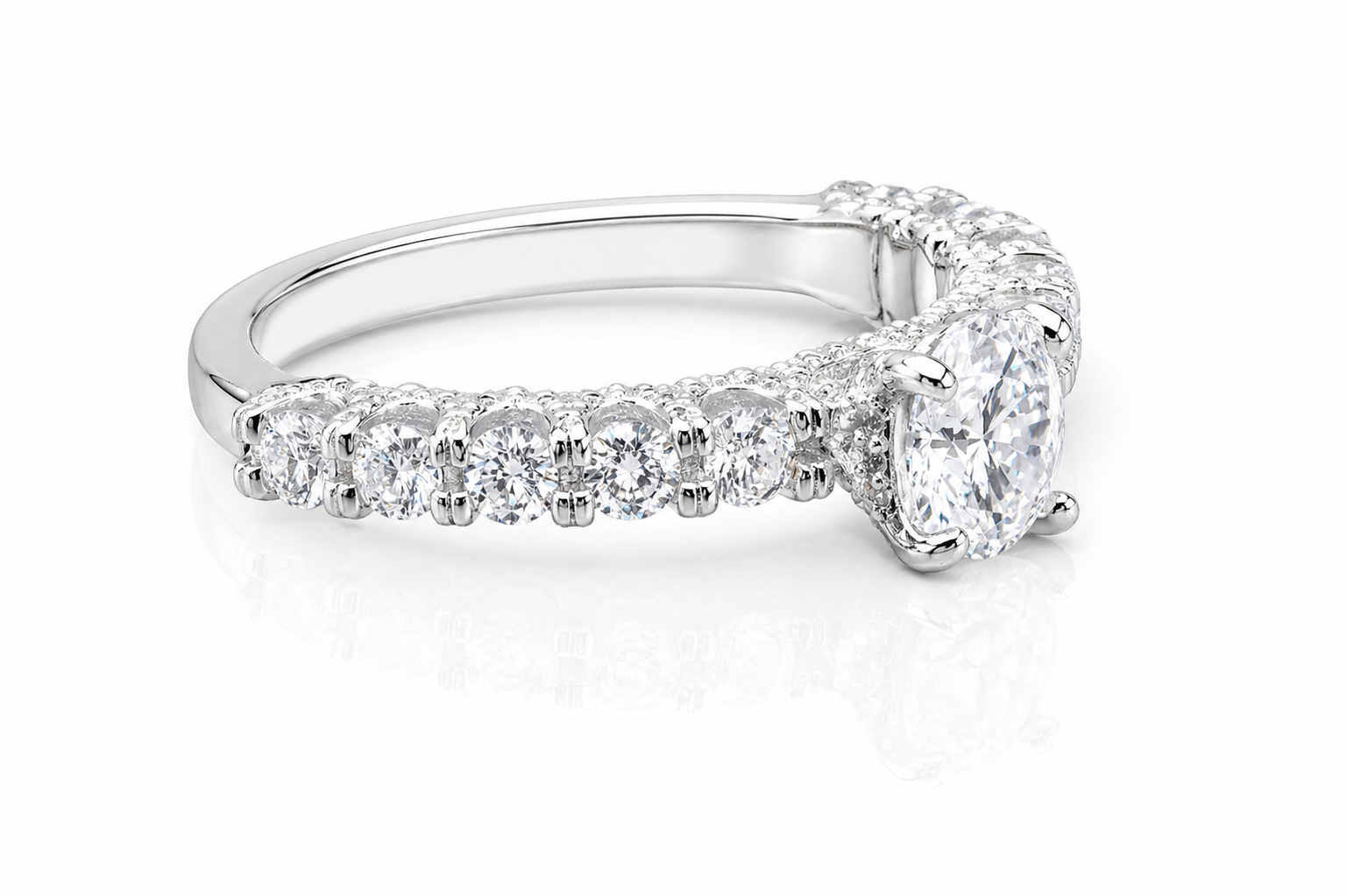 Round Moissanite Pave Engagement Ring 2.5CT | GRA Certified featuring a sparkling round center stone with pave-set smaller stones along a polished band.