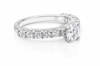 Round Moissanite Pave Engagement Ring 2.5CT | GRA Certified featuring a sparkling round center stone with pave-set smaller stones along a polished band.