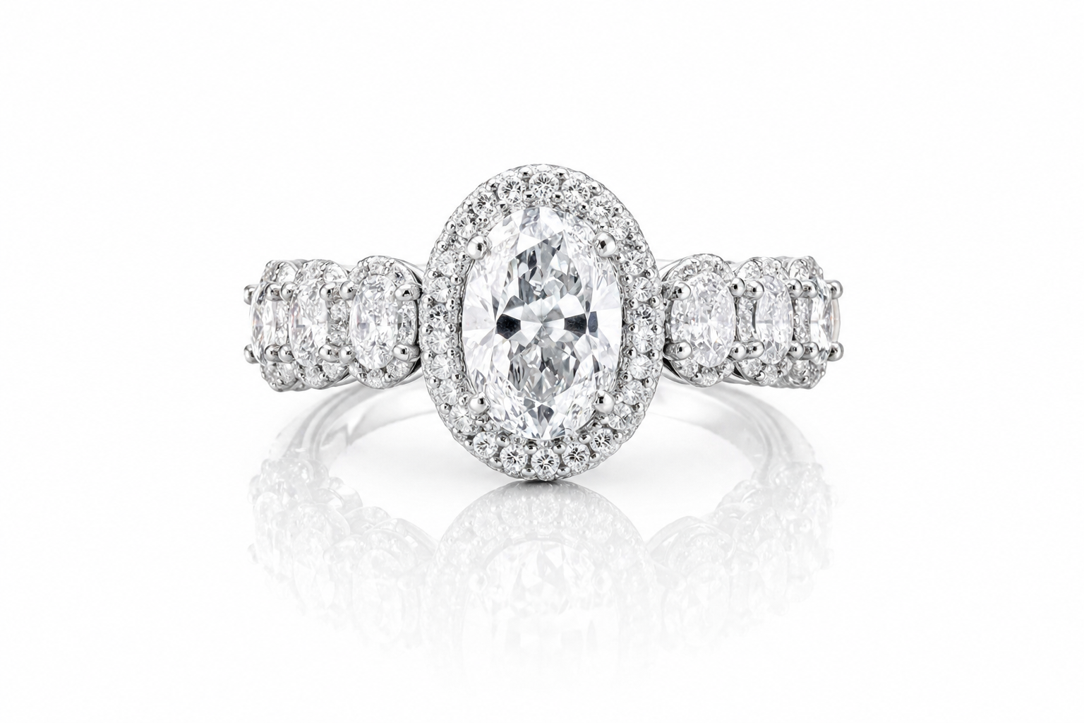 Oval Moissanite Halo Wedding Ring 2.3CT | GRA Certified featuring a sparkling oval center stone surrounded by a halo of smaller stones with additional accents on the band.