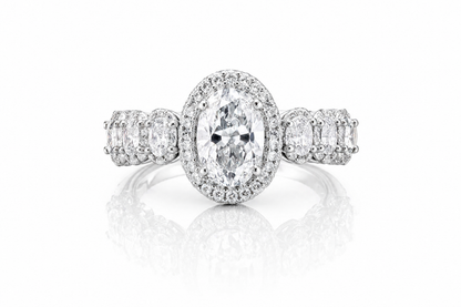 Oval Moissanite Halo Wedding Ring 2.3CT | GRA Certified featuring a sparkling oval center stone surrounded by a halo of smaller stones with additional accents on the band.