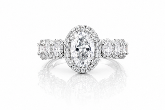 Oval Moissanite Halo Wedding Ring 2.3CT | GRA Certified featuring a sparkling oval center stone surrounded by a halo of smaller stones with additional accents on the band.