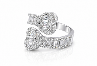 Moissanite Baguette Open Heart Ring | GRA Certified Diamond Approved featuring two open heart shapes adorned with baguette and round cut stones on a polished band.
