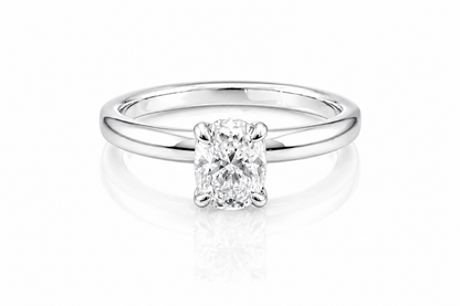Oval Moissanite Solitaire Engagement Ring 1CT | GRA Certified featuring a sparkling oval-cut stone set on a polished silver band, perfect for elegant and timeless engagement jewelry.