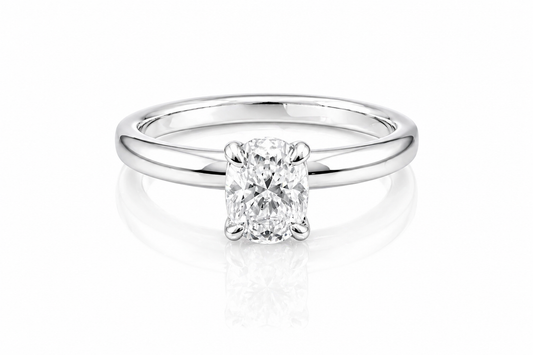 Oval Moissanite Solitaire Engagement Ring 1CT | GRA Certified featuring a sparkling oval-cut stone set on a polished silver band, perfect for elegant and timeless engagement jewelry.