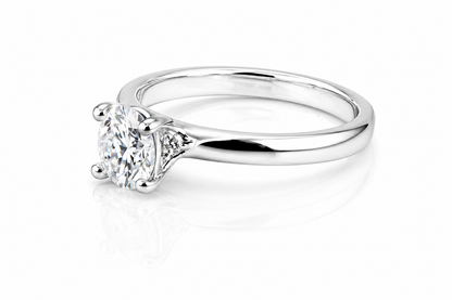 Oval Moissanite Solitaire Engagement Ring 1CT | GRA Certified featuring a sparkling oval moissanite set in a sleek, polished silver band, ideal for an elegant engagement gift.