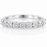 U-Prong Moissanite Half Eternity Wedding Band – 1CT VVS1 D Color | 925 Sterling Silver | GRA Certified, featuring sparkling round moissanite stones set in a polished silver band.