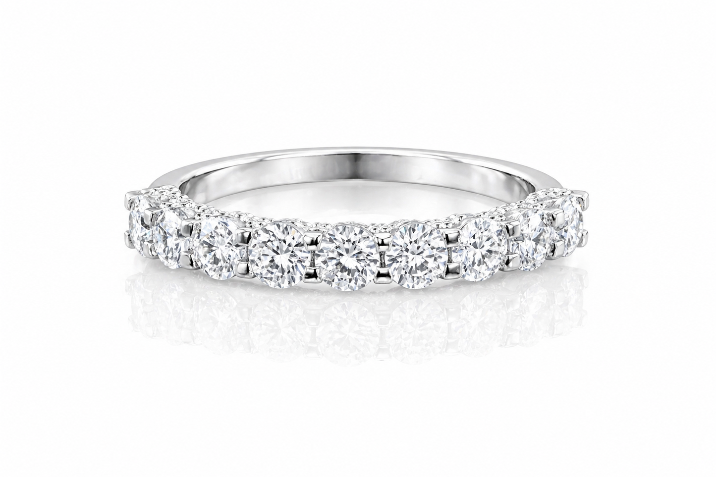 U-Prong Moissanite Half Eternity Wedding Band – 1CT VVS1 D Color | 925 Sterling Silver | GRA Certified, featuring sparkling round moissanite stones set in a polished silver band.