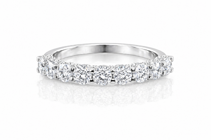 U-Prong Moissanite Half Eternity Wedding Band – 1CT VVS1 D Color | 925 Sterling Silver | GRA Certified, featuring sparkling round moissanite stones set in a polished silver band.