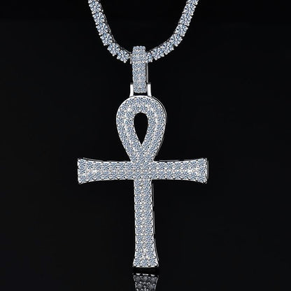 Silver ankh cross pendant on a black background