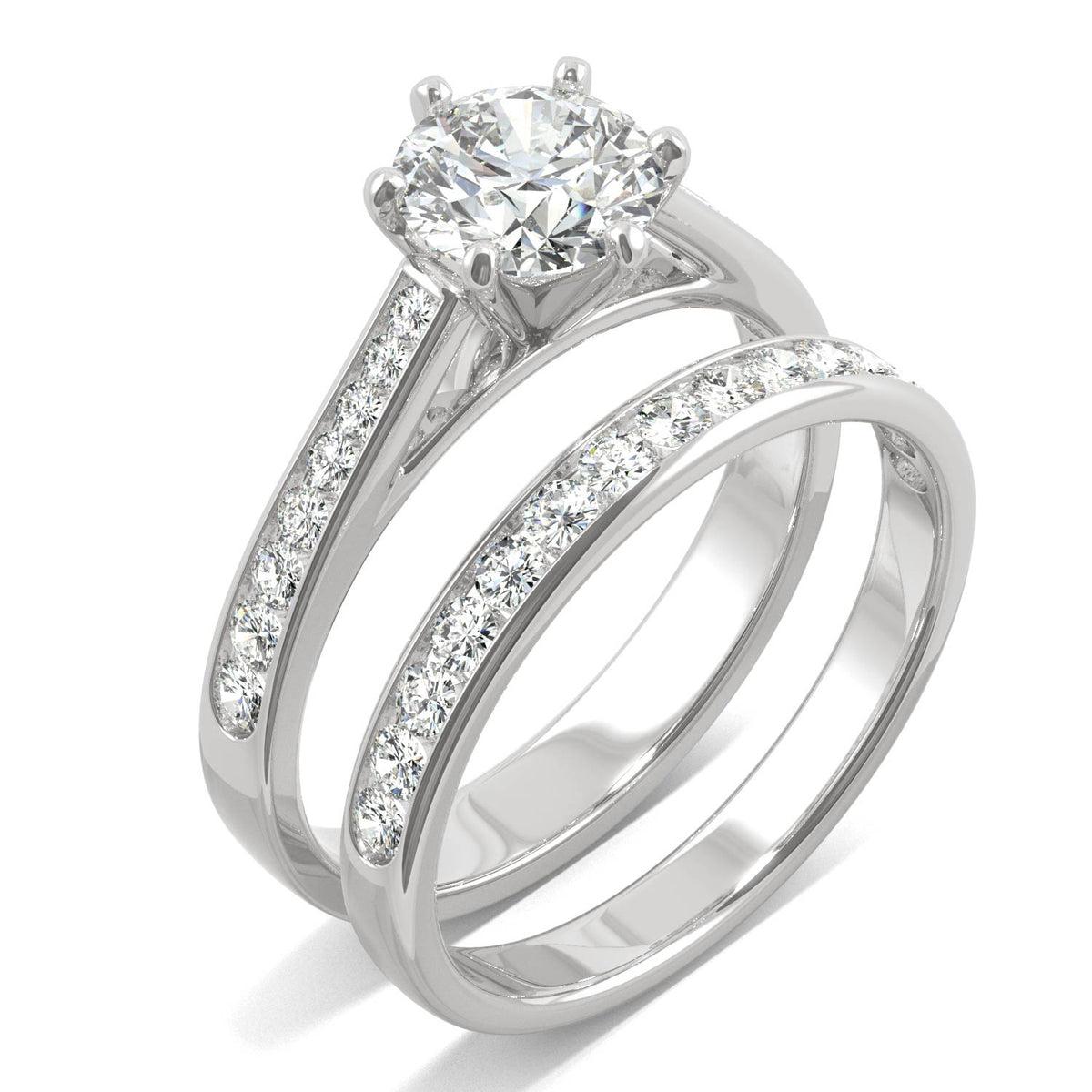 Elegant silver bridal ring set featuring a sparkling center stone and micro pavé diamonds along the bands, showcasing the Moissanite Micro Pavé Bridal Ring Set 2.5CT | GRA Certified.