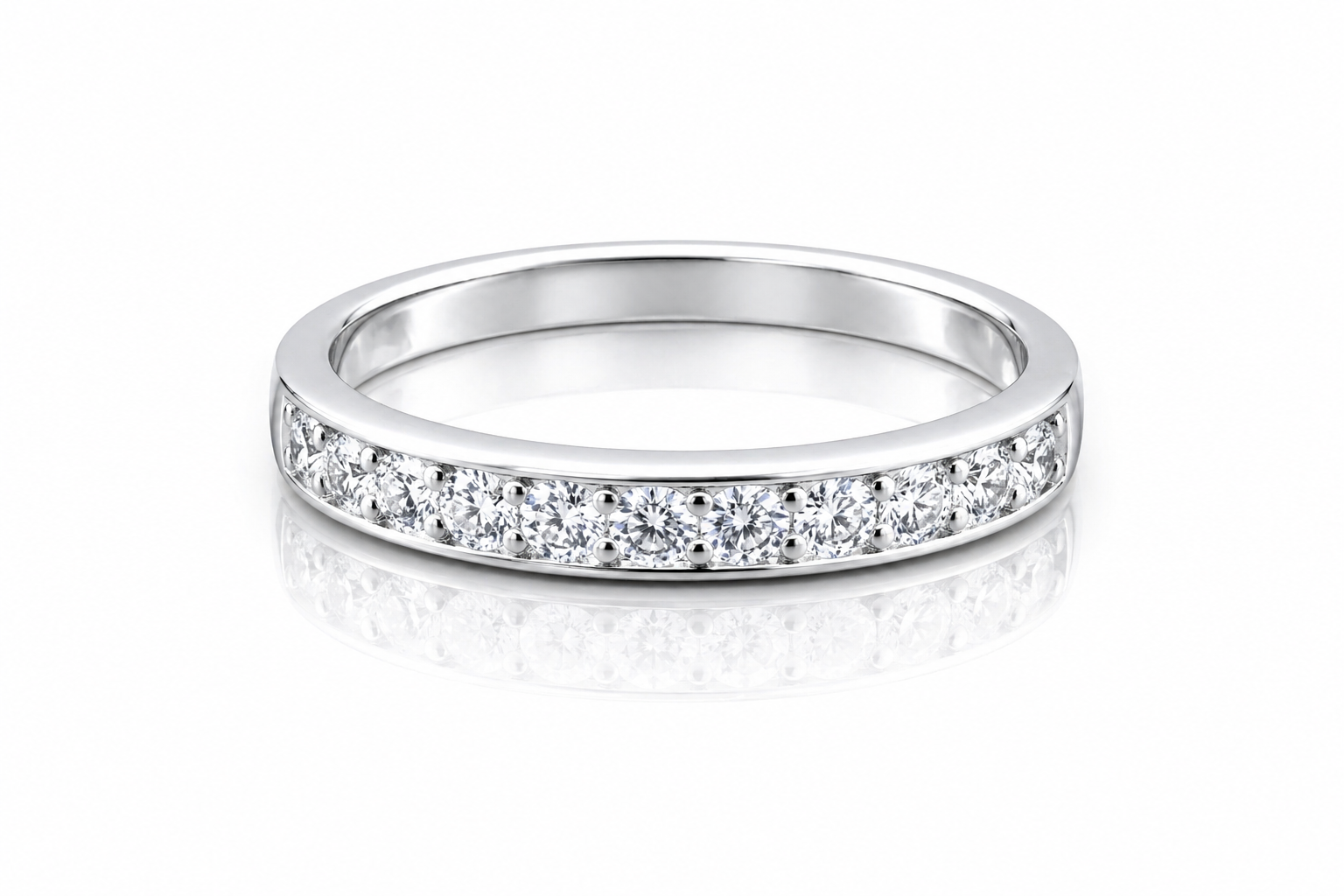 Moissanite Half Eternity Band – 1CT Round Cut VVS1 D Color | 925 Sterling Silver | GRA Certified Wedding Band for Women featuring sparkling round cut stones set in a polished silver band.