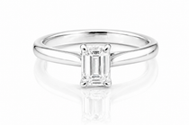 Classic Emerald Cut Moissanite Solitaire Ring 1CT | GRA Certified with a sleek polished band and a radiant emerald-cut stone set in a minimalist four-prong setting.