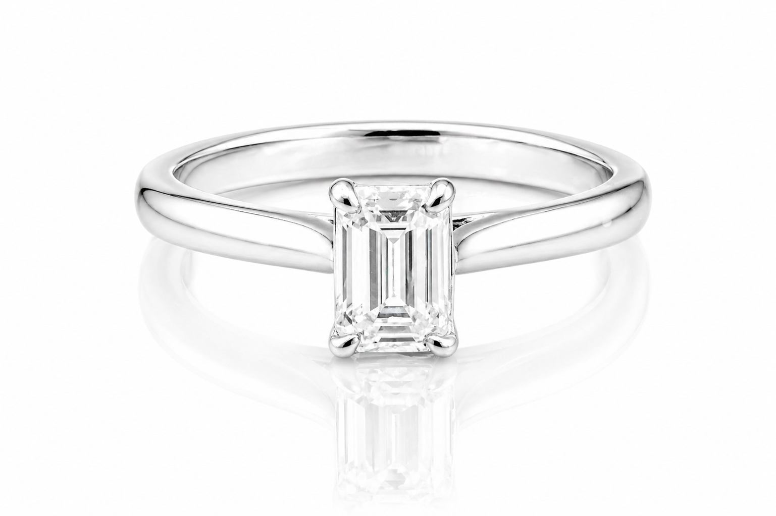 Classic Emerald Cut Moissanite Solitaire Ring 1CT | GRA Certified with a sleek polished band and a radiant emerald-cut stone set in a minimalist four-prong setting.