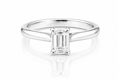 Classic Emerald Cut Moissanite Solitaire Ring 1CT | GRA Certified with a sleek polished band and a radiant emerald-cut stone set in a minimalist four-prong setting.