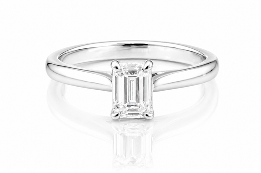 Classic Emerald Cut Moissanite Solitaire Ring 1CT | GRA Certified with a sleek polished band and a radiant emerald-cut stone set in a minimalist four-prong setting.