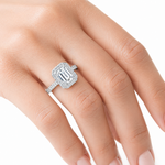 Model Shot of emerald cut moissanite ring with diamond halo band