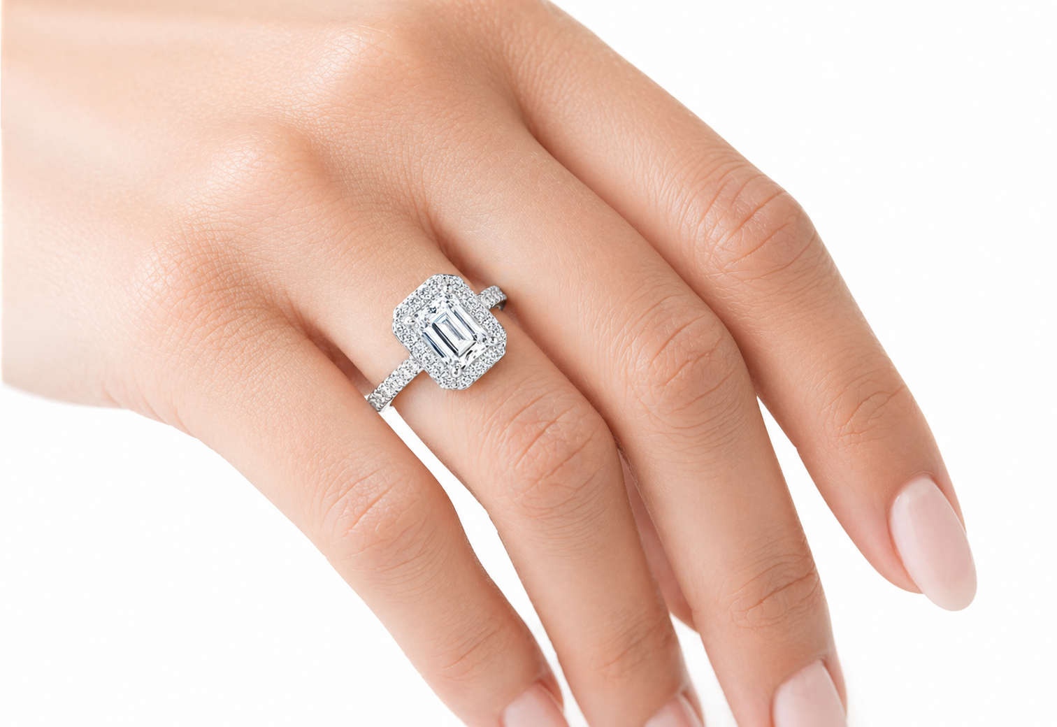 Model Shot of emerald cut moissanite ring with diamond halo band