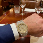 Man wearing 44MM two tone gold silver bust down moissanite watch VVS – Paradise Gems Atlanta